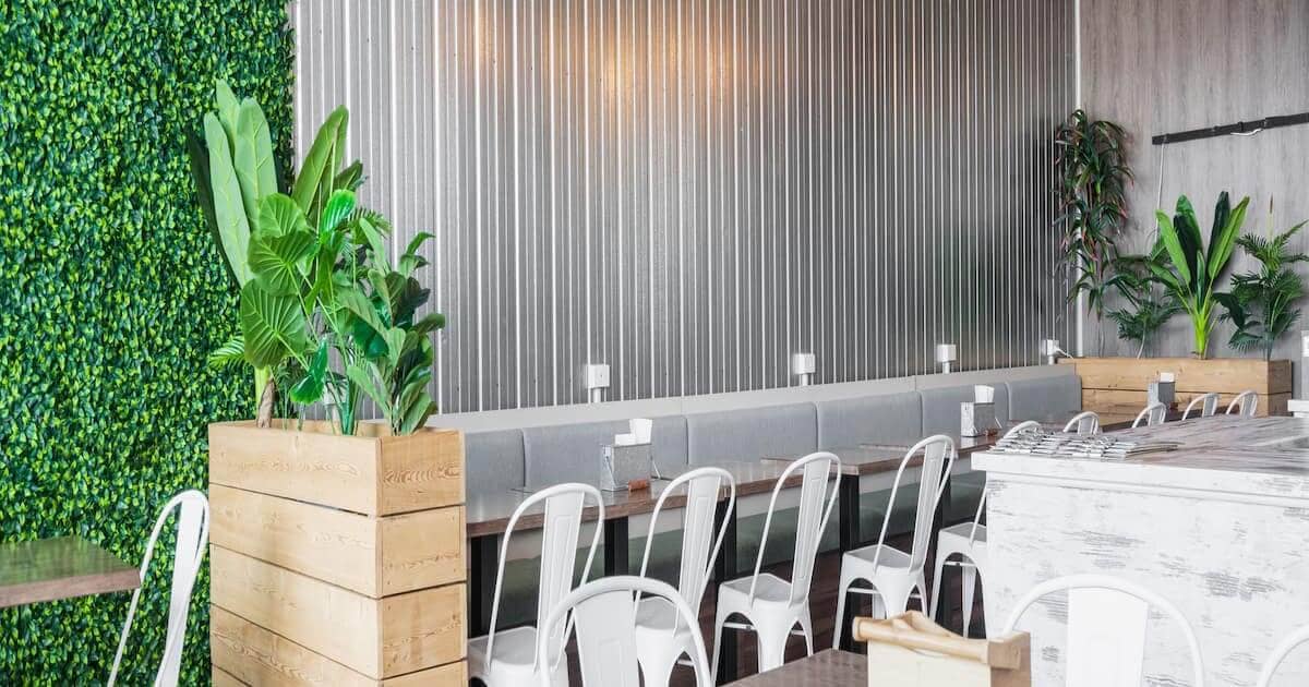 Empty restaurant with green wall