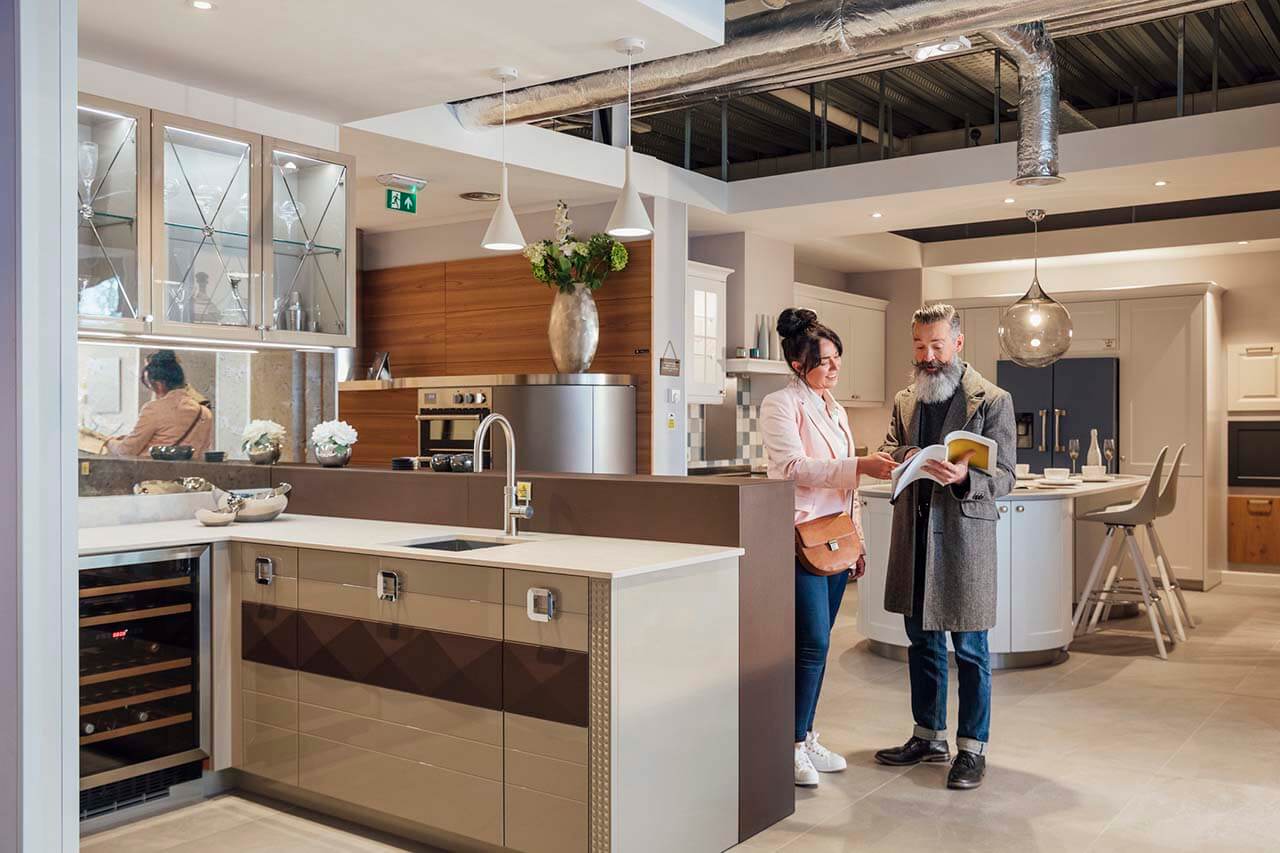 Customers in a kitchen showroom